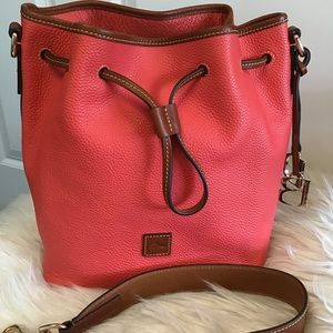 Dooney pebble grain drawstring shoulder bucket bag